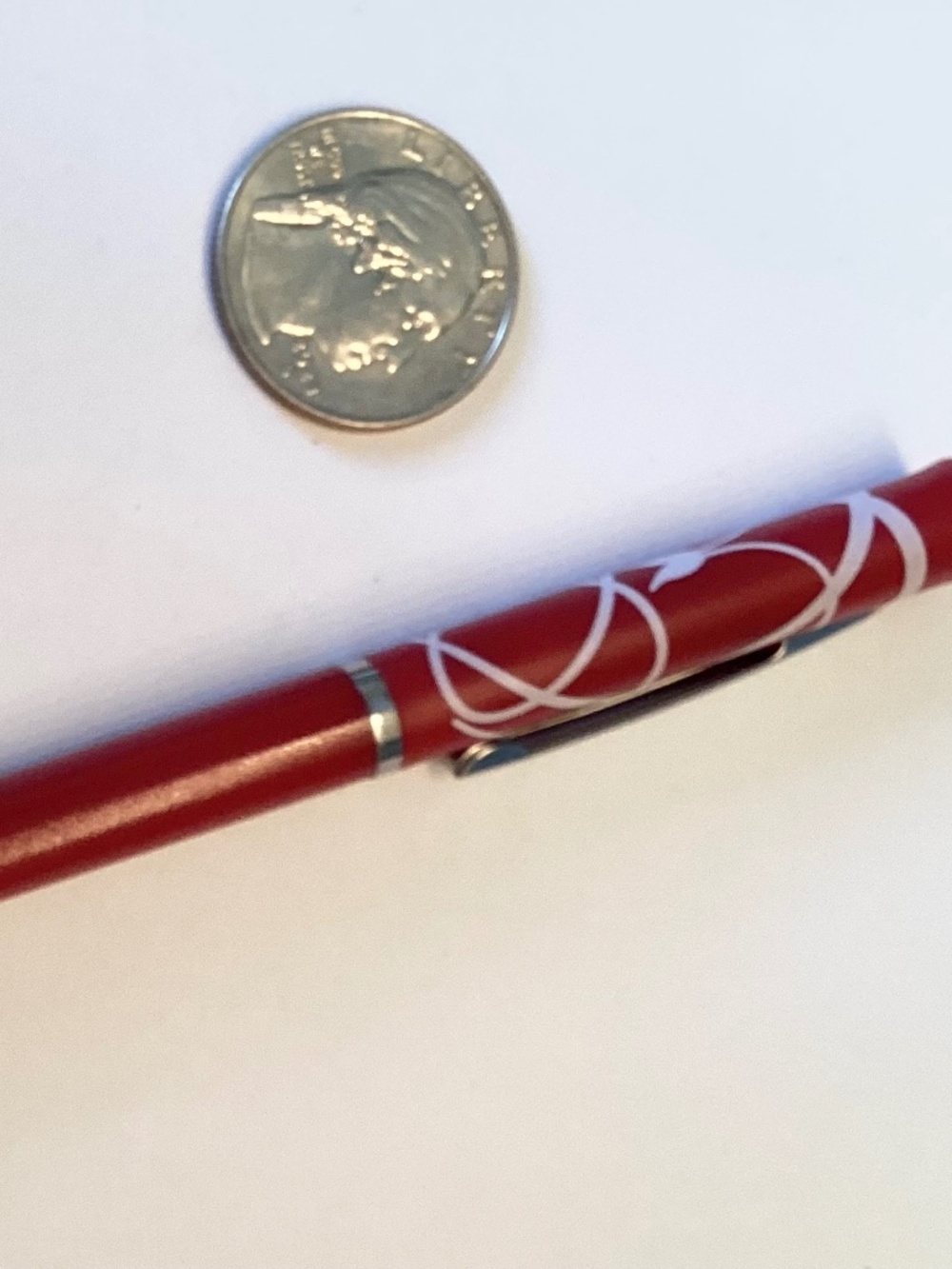Pretty slim designed swirl pattern pen!  Smooth writing blue ink!